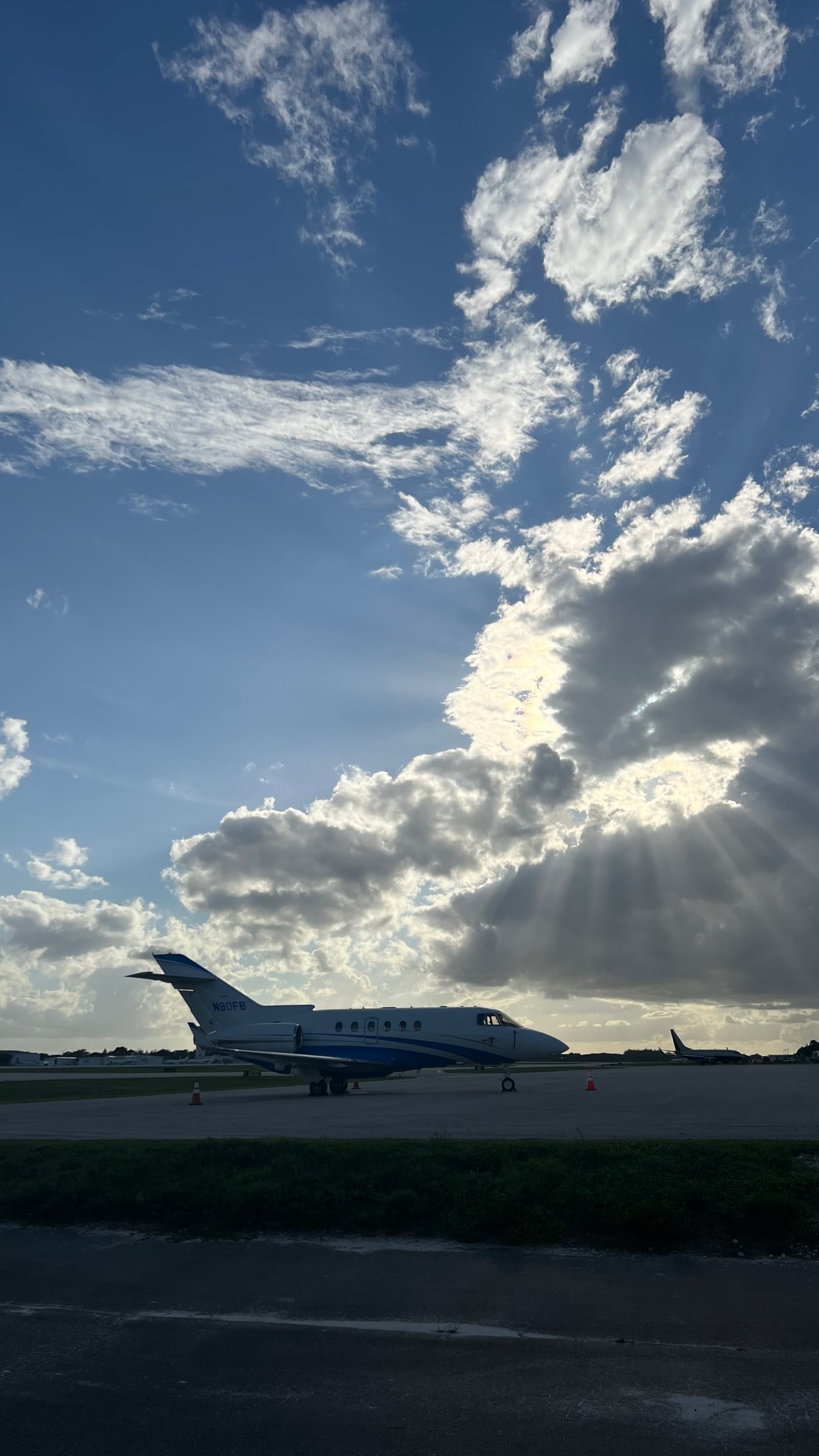 JYD Jets aircraft on the ramp under the late afternoon sky